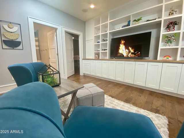Loaded with built-in shelves/cabinets