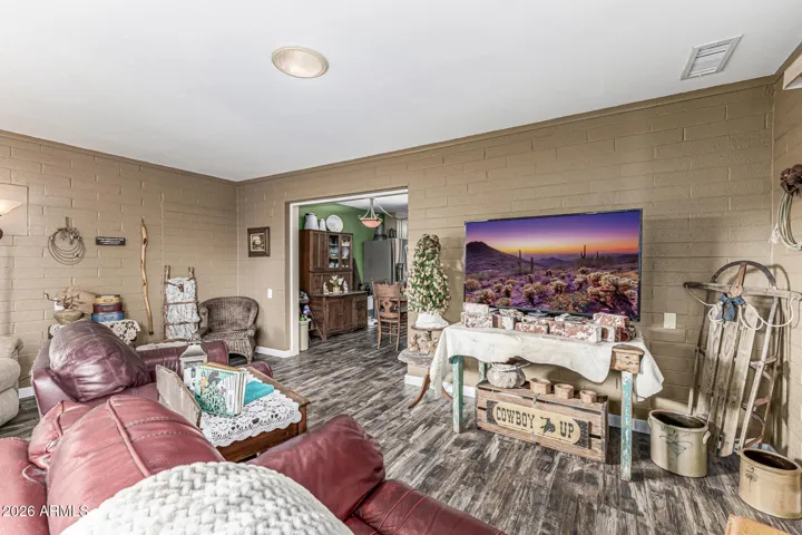 DEN THAT OPENS TO THE DINING ROOM / KITCHEN - OPENING TO THE ARIZONA ROOM IS TO THE RIGHT