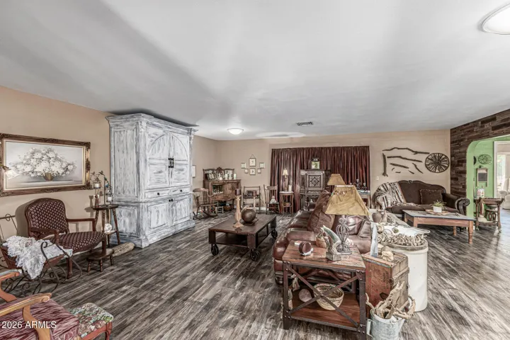 GREAT ROOM - SHOWING ENTRY TO ARIZONA ROOM BEHIND CURTAINS