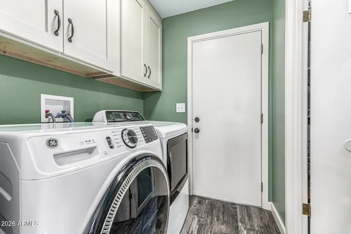 LAUNDRY ROOM - PANTRY ON THE RIGHT - GARAGE THROUGH THE DOOR