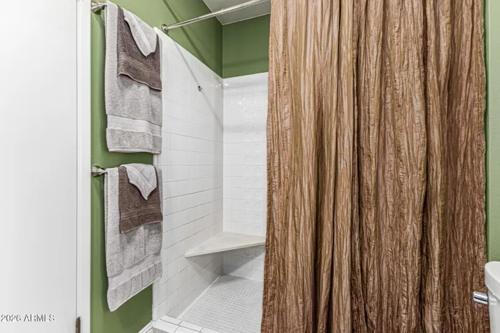 REMODELED SHOWER IN THE PRIMARY BEDROOM