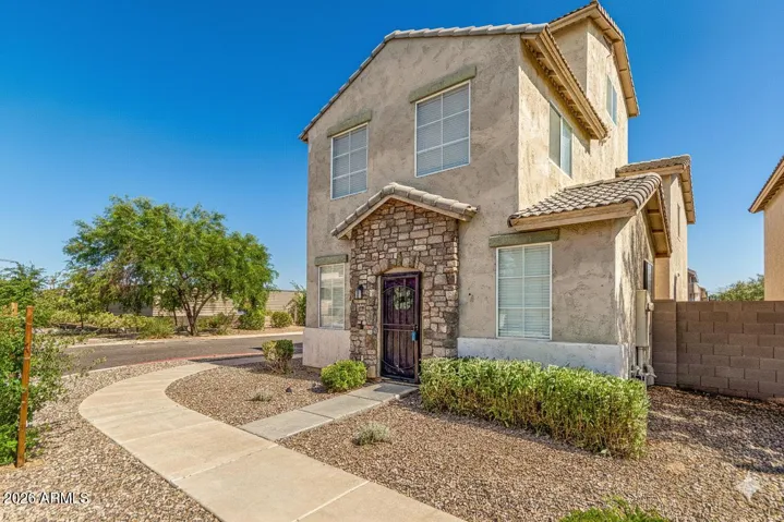 Rare 3-story corner residence on the largest lot in the community, offering a very spacious backyard
