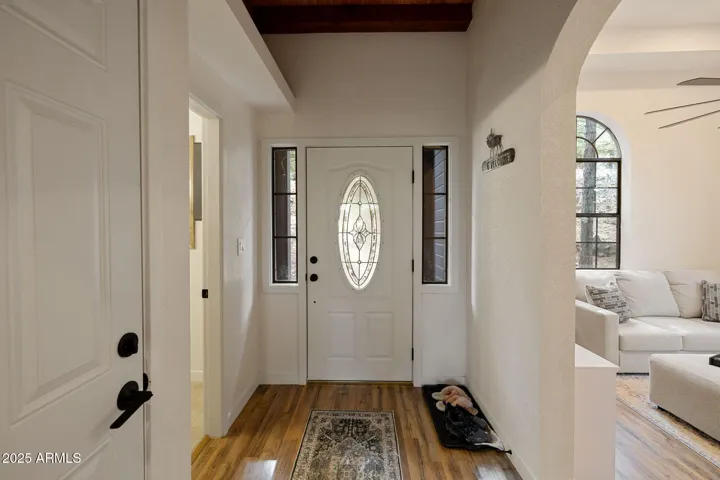 Entry way with wood beam ceiling