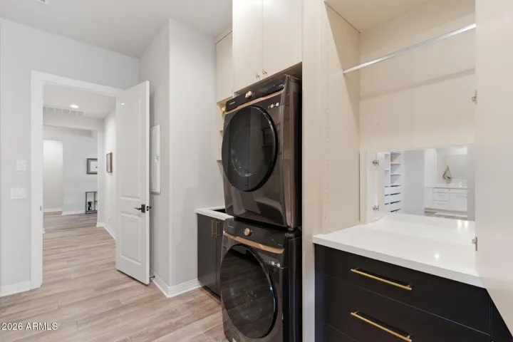 Laundry Room with Private Primary Suite Pass-Through