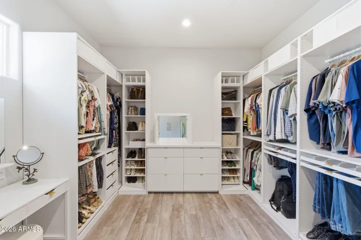 Primary Closet with Private Laundry Pass-Through