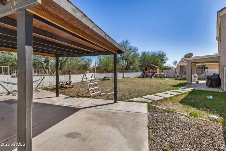 Large private backyard with pergola covered patio, perfect for BBQ's and outdoor entertaining