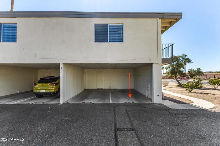 Assigned Parking area with storage closet