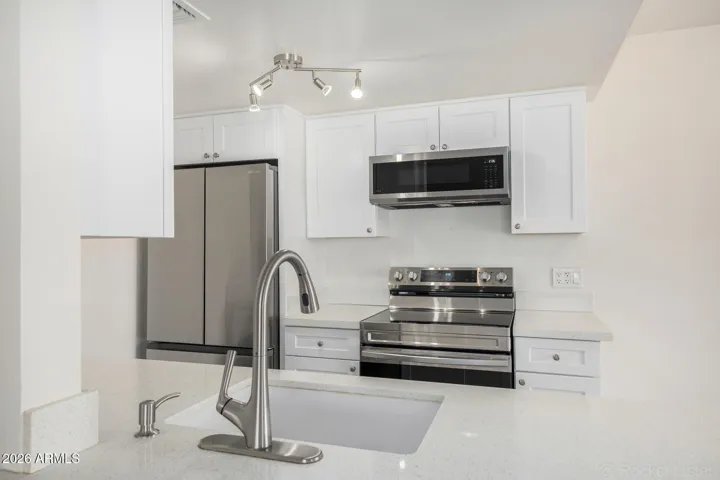 Kitchen open to living area