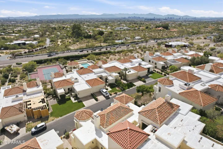 Pool, tennis court, and cabana conveniently located just across the street and down the path