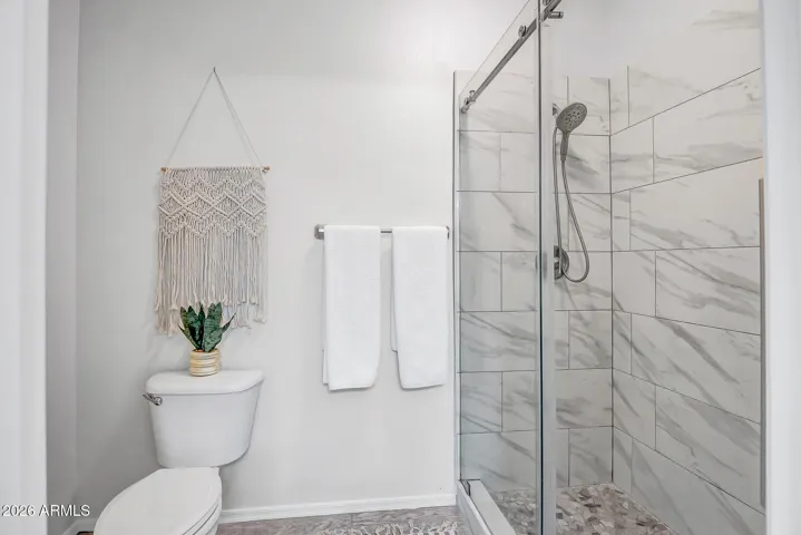 Master walk-in upgraded tiled shower