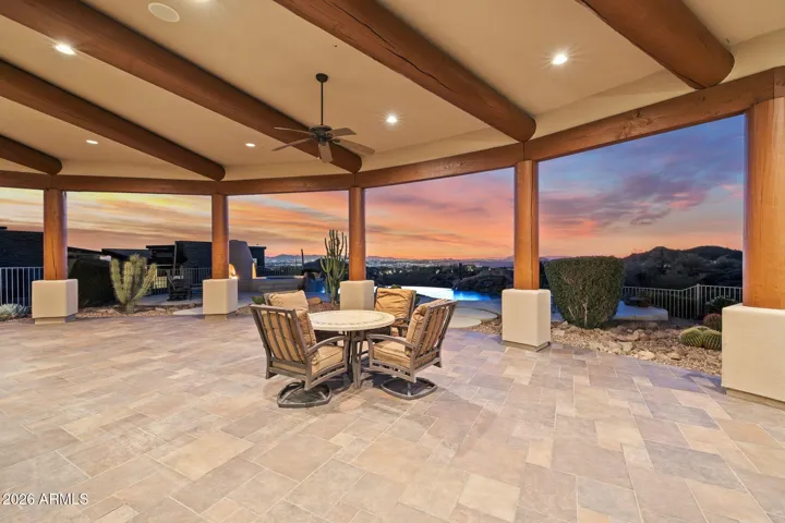 Generous covered patio for relaxing and entertaining.