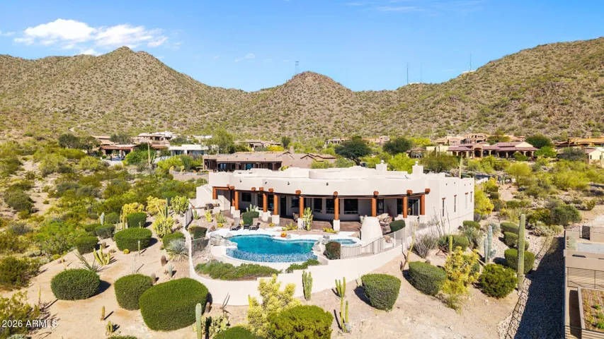 Stunning custom home on a 1.148 acre hillside lot.