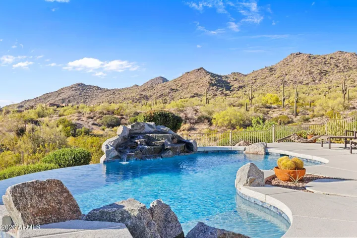 Open desert foreground creates rare privacy and sweeping views across the Valley.