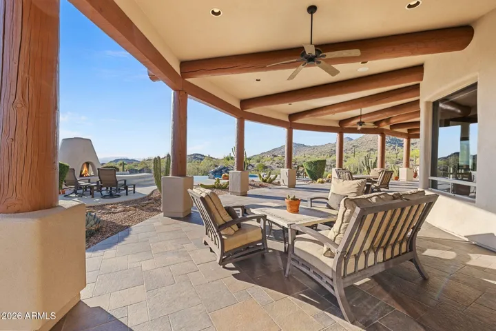 Generous covered patio for relaxing and entertaining.