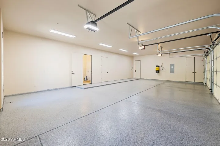Spacious oversized 3 car garage with fresh epoxy finish.