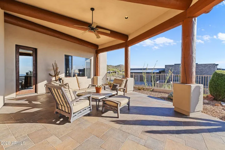 Generous covered patio for relaxing and entertaining.
