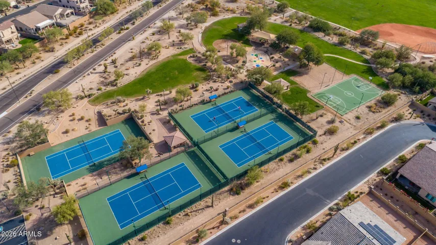 Multiple tennis courts and sports courts.