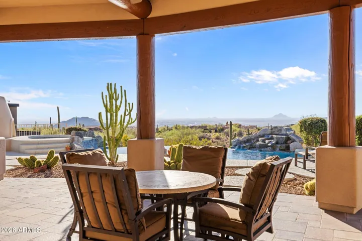 Generous covered patio for relaxing and entertaining.