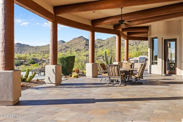 Generous covered patio for relaxing and entertaining.