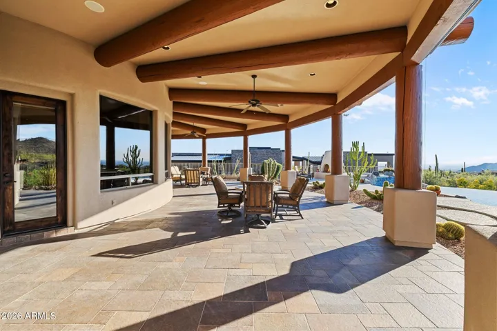 Generous covered patio for relaxing and entertaining.