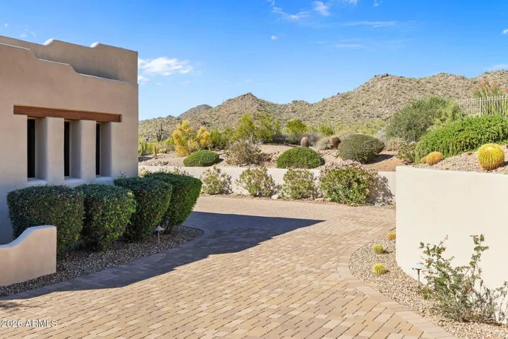 Garage entrances at the side of the home.