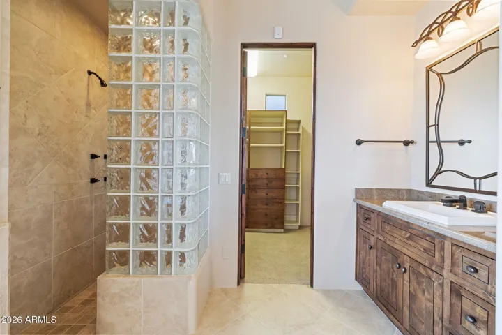 Junior suite bathroom, twin vanities, shower & walk-in closet.