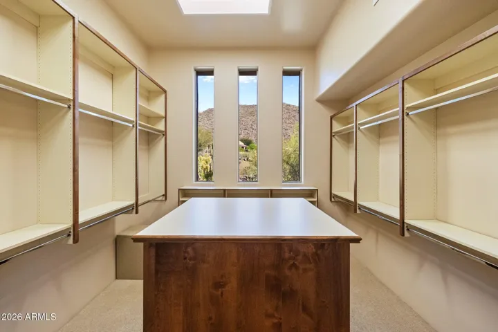 Extra large primary closet with mountain views.