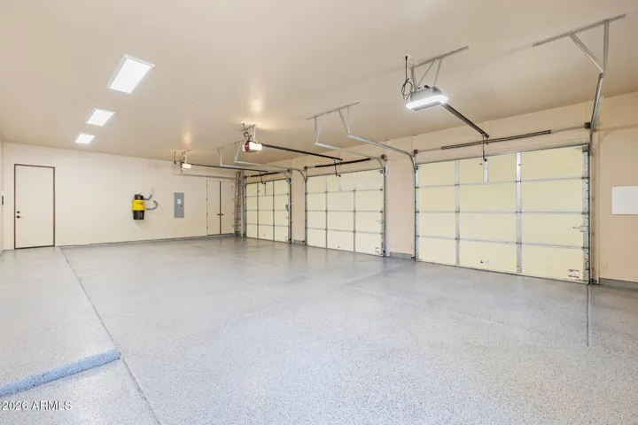 Spacious oversized 3 car garage with fresh epoxy finish.