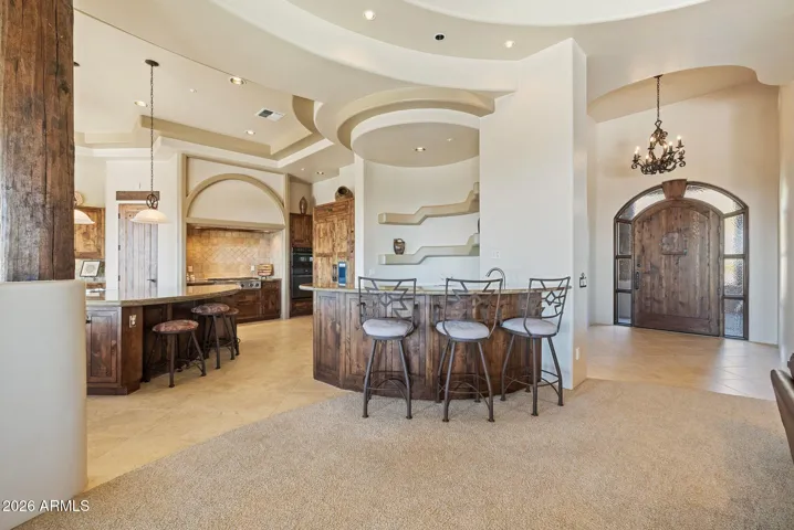 Wet-bar between kitchen and living room.