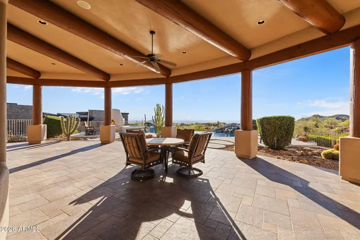 Generous covered patio for relaxing and entertaining.