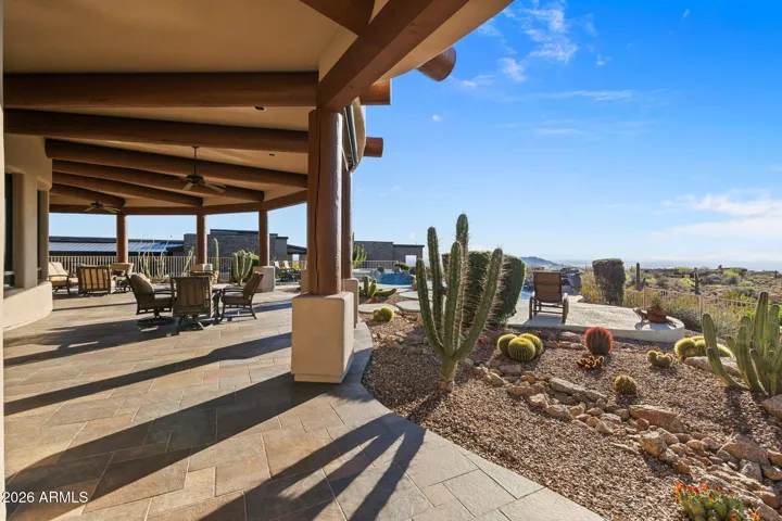 Generous covered patio for relaxing and entertaining.