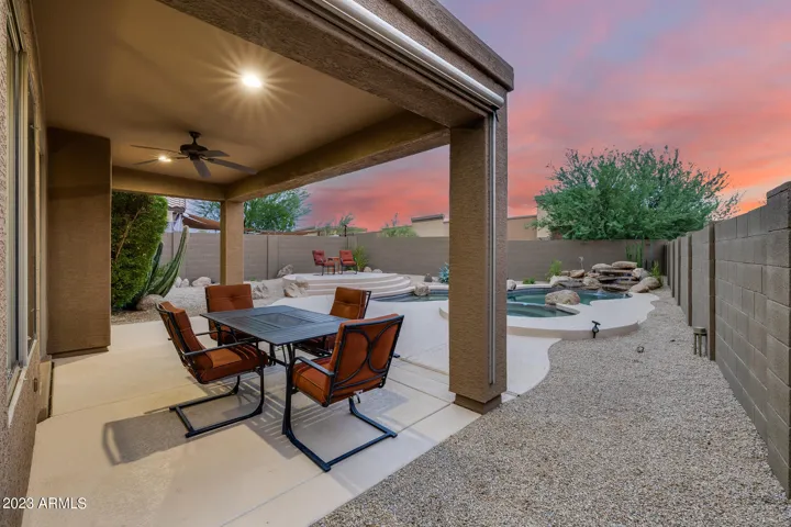Easy care yard with pool, waterfall & spa!