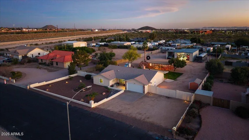 Beautiful home with no HOA on Just Under 1 Acre Lot with 1500 Square Foot Shop and RV Parking