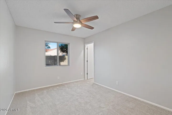 Bedroom #2 With Walk-In Closet, New Carpet and Fan with Light