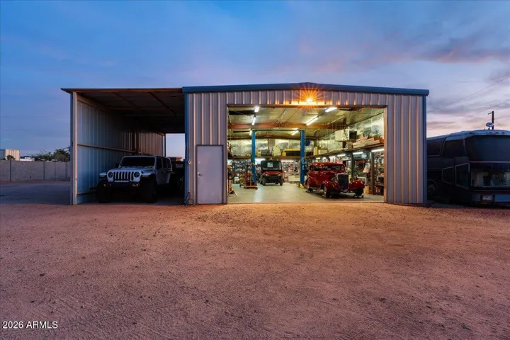 Large 30'x50' Insulated Shop with AC, 12,000 Pound Hoist and Covered RV Parking
