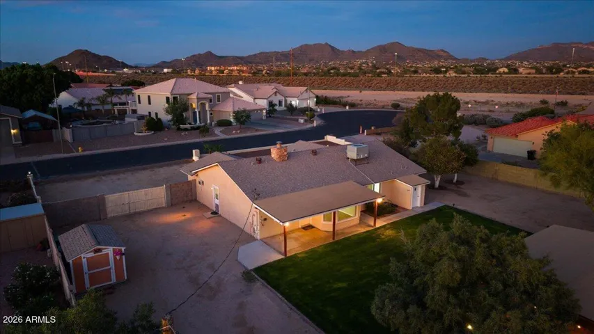 Beautiful home with no HOA on Just Under 1 Acre Lot with 1500 Square Foot Shop and RV Parking