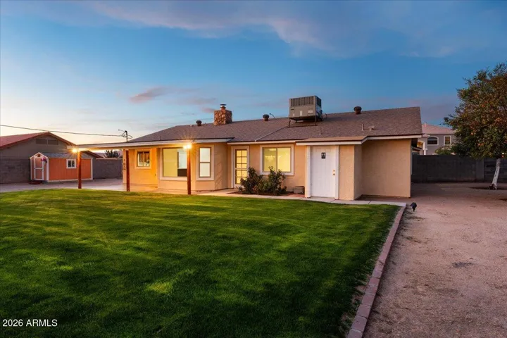 Large Grass Back Yard Between House and Gazebo