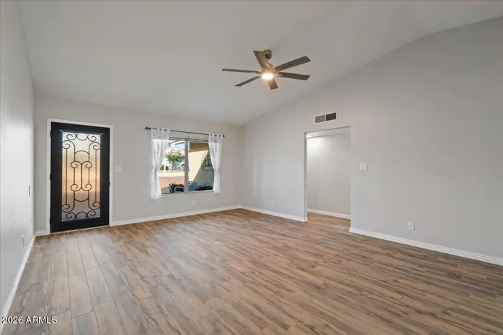 New Ceiling Fan with Adjustable Lighting and Porcelain Wood Plank Floor