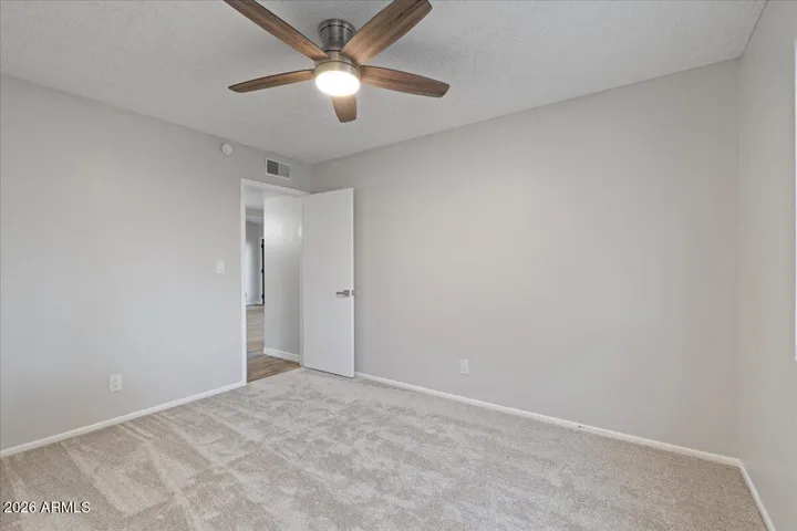 Bedroom #2 With Walk-In Closet, New Carpet and Fan with Light