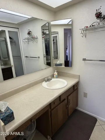Single sink with lots of counterspace and cabinets