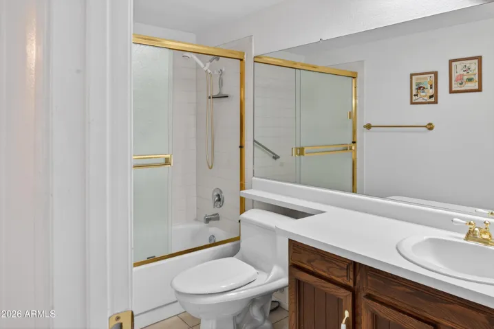 Full Hall bathroom with tub shower combo
