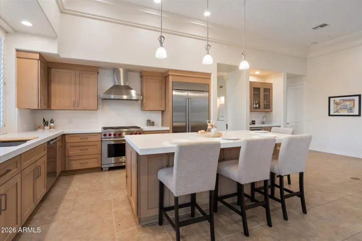 Full kitchen remodel includes custom cabinetry, quartz counter tops, and appliances from Sub-Zero, Wolf, and Cove.