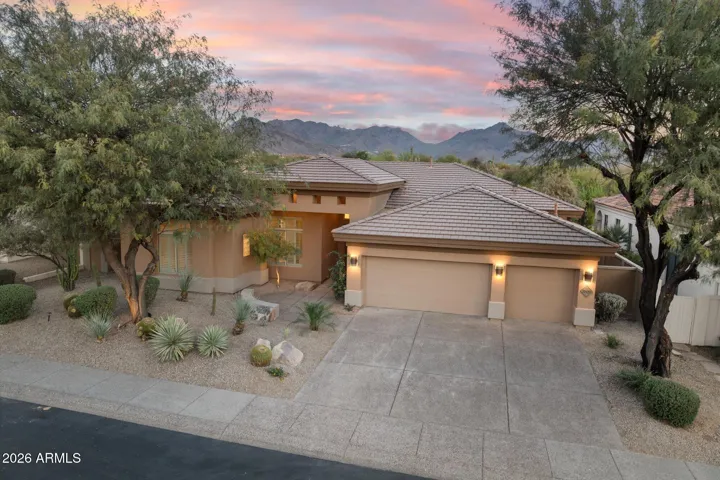 Enjoy panoramic mountain and golf course views from the entire east side of the home