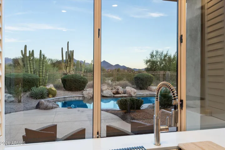 Enjoy spectacular desert, golf, and mountain views from your kitchen