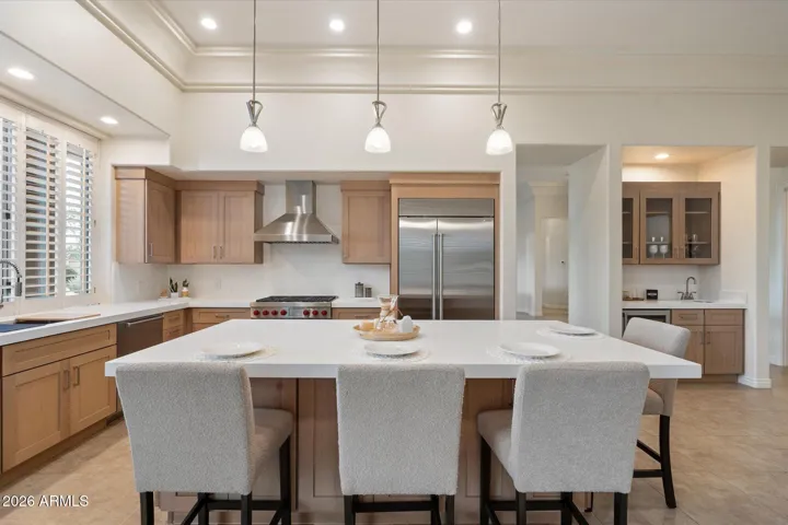 Full kitchen remodel includes custom cabinetry, quartz counter tops, and appliances from Sub-Zero, Wolf, and Cove.