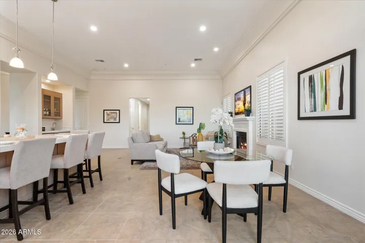 Great room includes fresh paint, new light fixtures, and a fully remodeled kitchen