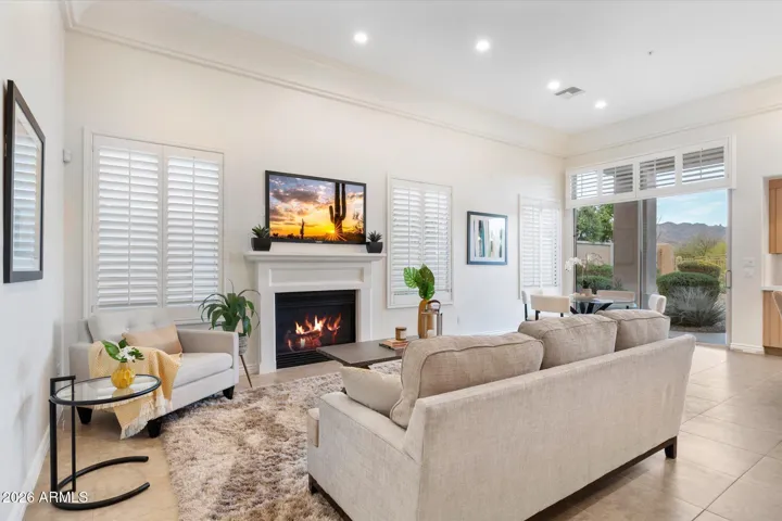 Great room includes fresh paint, new light fixtures, and a fully remodeled kitchen