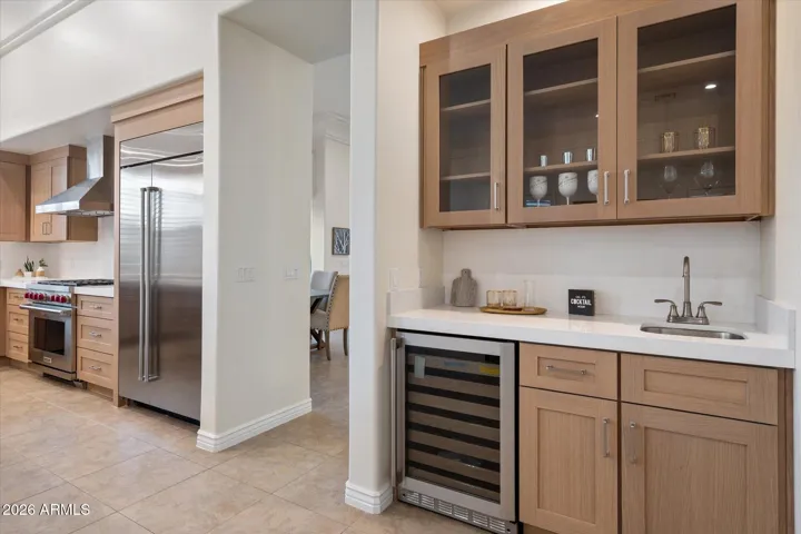 Fully remodeled kitchen includes beverage station for convenience