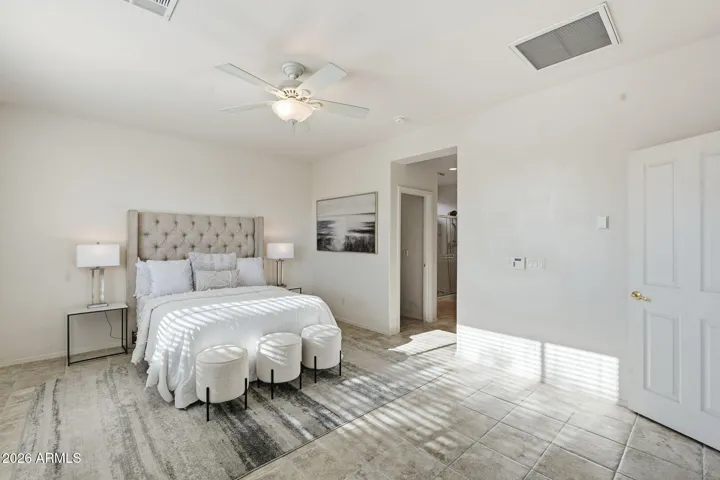Large primary with walk in closet and en-suite bath