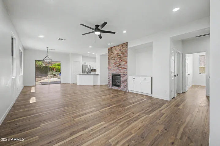 All new Luxury Vinyl Plank Flooring Throughout! Gas Fireplace in Great Room with Brick Fireplace Wall!